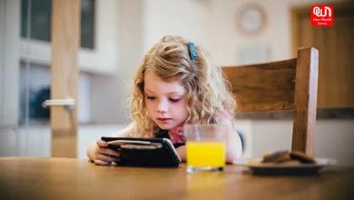 Baby Watching Mobile While Eating