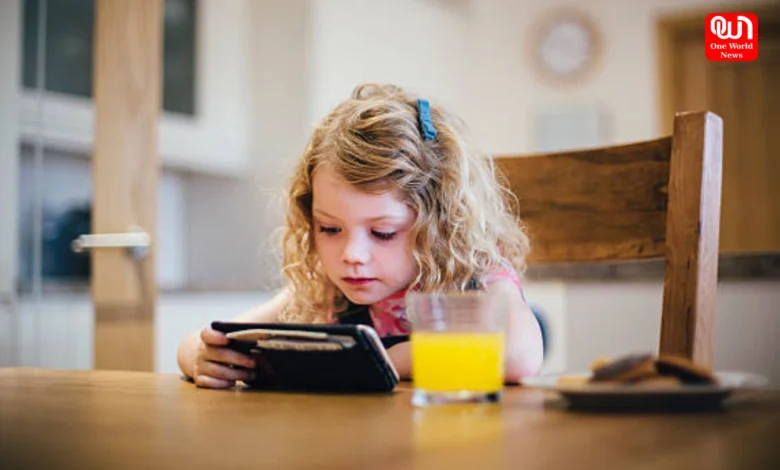 Baby Watching Mobile While Eating